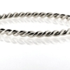 Billede af Armring snoet tråd 2*2,5 mm., br. ca. 4,75 mm. 14 kt. hvg.