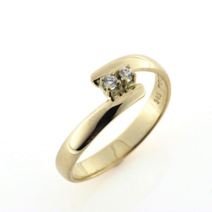 Billede af Ring forskudt, grabbe fatning 2 stk. 2 m/m. syn. stene. 14 kt.