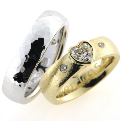 Billede af 1 par vielsesringe, damering fattet med hjerte diamant 14 kt. og 14 kt. hvg.
