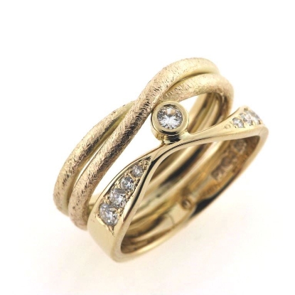 Billede af Dobbelt ring, 9 brillanter 14 kt.