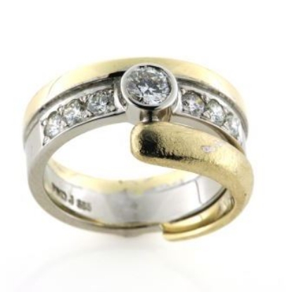 Billede af Ring 7 brill. a ca. 0,50 + 6* 0,10 ct. w/vs. 14 kt. + 14 kt. hvg.